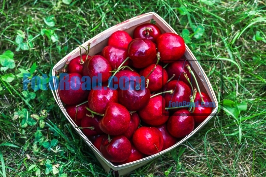 Cherry inside wooden  basket
