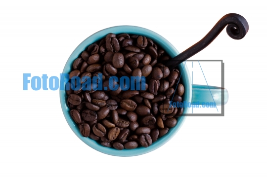 Coffee  mug with coffee beans isolated on white