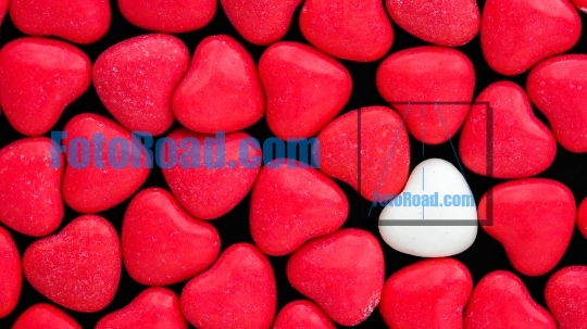 Colorful candy hearts  background   
