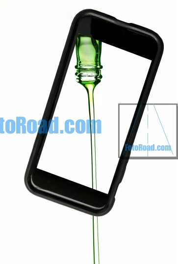 Green liquid streem from glass bottle