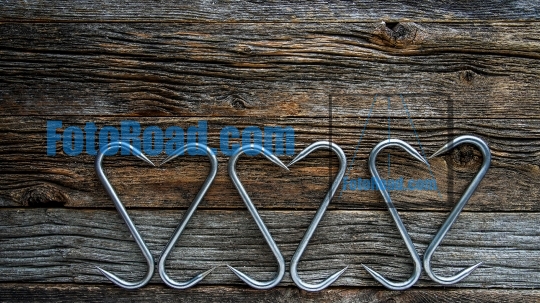 Mixed hook's on rustic wooden background with copy space
