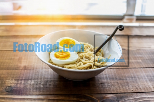 Ramen noodle with eggs and sunbeam