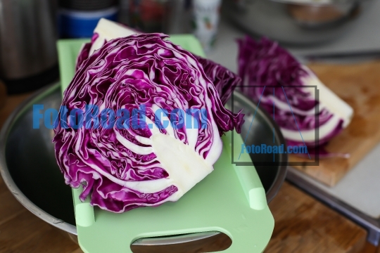 Red cabbage in kitchen ready for slicing