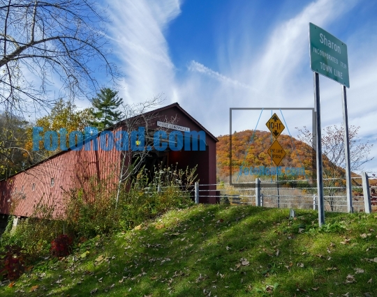 West Cornwall Covered Bridge with blue cloudy sky