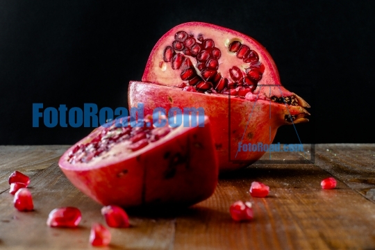 Pomegranate apple on wooden table